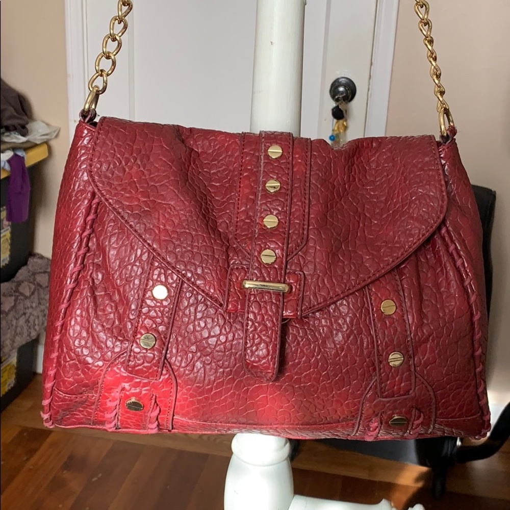 KDNY pebbled faux leather bag.